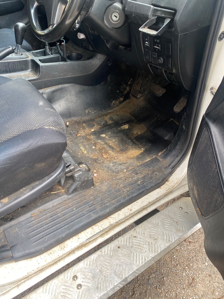 Extreme condition: footwell covered in dried mud