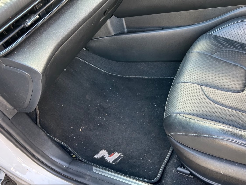 Light condition: car floor with light dust before cleaning